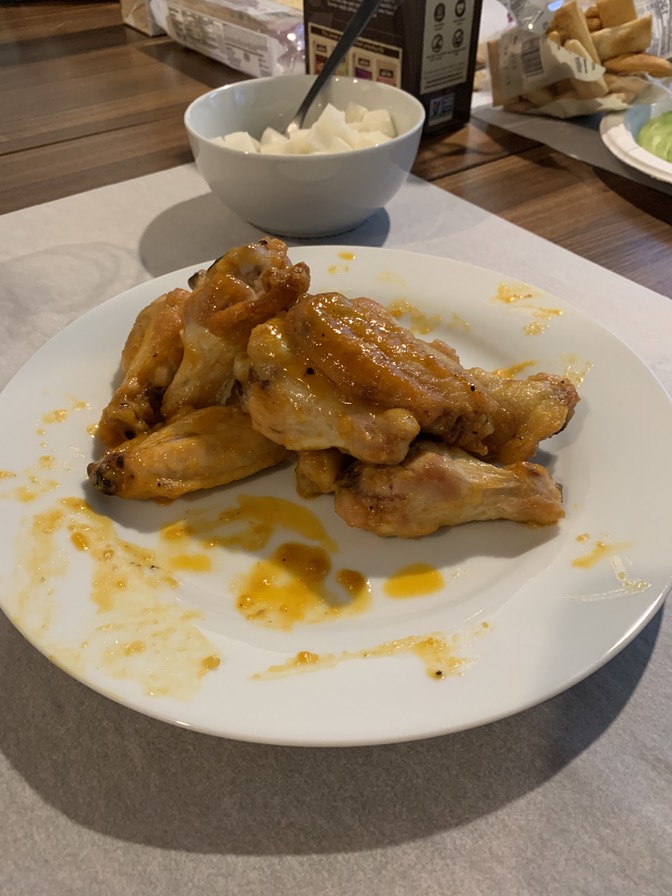Turns out it's impossible to get a photo of a full plate of wings at a party.